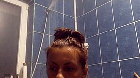 Lesbian shower turns steamy with big tits on display.