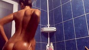 Lesbian shower turns steamy with big tits on display.