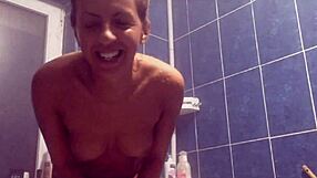 Lesbian shower turns steamy with big tits on display.