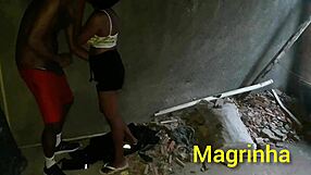 Abandoned house in favela hosts skinny girl and black guy