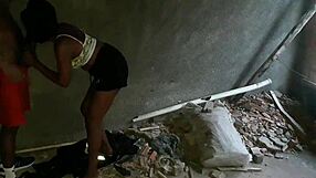 Abandoned house in favela hosts skinny girl and black guy