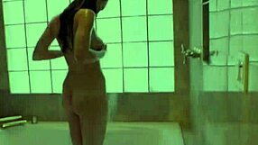 Kinky brunette in heels bathes messily, enema leads to squirting milk