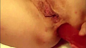 Milf Uses Red Dildo for Intense Fucking in Homemade Video