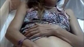 Sarita plays a game while relaxing at home