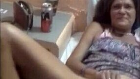 Sarita plays a game while relaxing at home