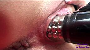 Two beautiful girls in lingerie touch and lick each other on orange couch, reaching orgasm