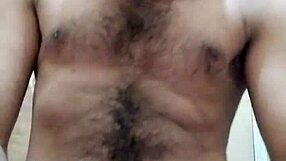 In the dimly lit room, a gay stud begs for intense anal fucking, his ass craving deep penetration from a muscular partner.