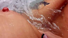 Pretty woman masturbates in hot tub with loud cumshot