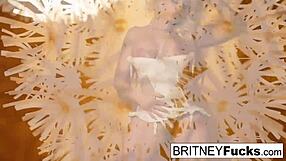 look at this sexy blonde teasing her big tits in retro style solo.