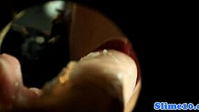 classy babe masturbates at gloryhole, ready for cum?