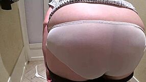 hidden camera spies on mature pawg milf changing shorts in fitting room