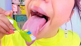 lila jordan brushes her teeth on webcam, showing saliva and tongue in tall fetish style