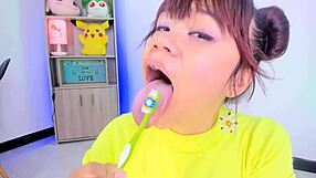lila jordan brushes her teeth on webcam, showing saliva and tongue in tall fetish style