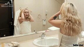 Blonde Girl Uses Vibrator on Hairless Pussy in Shower