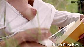 An impeccable lady, after reading a book, decides to RUB her PUSSY in her panties.