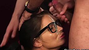 Nasty centerfold swallows cumshot on her face after blowbang handjob bukkake