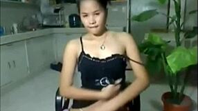 Asian woman uses dildo toy