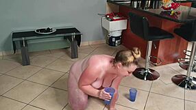 BUSTY FAT SLUT playing in PISS and SUCKING her piss covered TOES