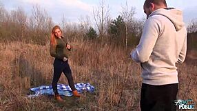 Skinny redhead with big tits gets oral and fucked outdoors by stranger