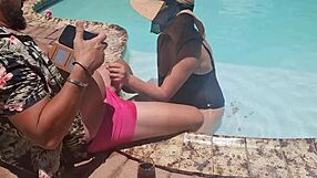 Blonde gives random guy a steamy pool blowjob on holiday