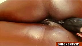 Teen ebony amateur fucks her ass with dildo in homemade New Year giveaway video.