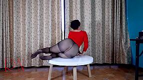 nice lady in pantyhose and heels striptease at the round table