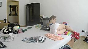 Antonia shows off her legs in panties and shoes