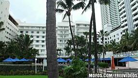 brunette flashes shaved pussy in bedroom masturbation