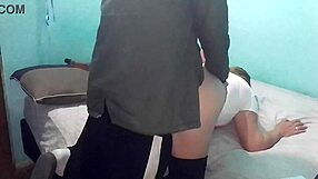 latina bent over on cold day in double bed