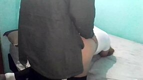 latina bent over on cold day in double bed