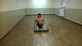 Milf bends over, fucks ass with big dildo, fingers hairy pussy on beach mattress 😏