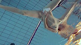 Tiny Nastya shows off her ass in a sexy pool dress