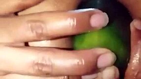 madrasta culona plays with a thick cucumber showing off her spread ass.