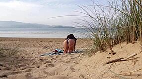 I FILMED A CURVY MILF CHANGING CLOTHES AND DOING EXERCISES ON THE BEACH