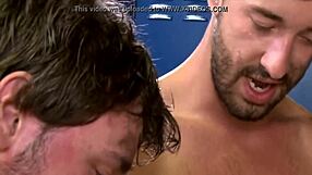 Naughty guy sucking three in locker room orgy