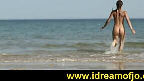 On the beach, a gay guy surfs up while fingering himself in softcore solo action