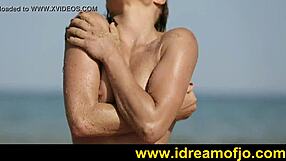 On the beach, a gay guy surfs up while fingering himself in softcore solo action