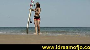 On the beach, a gay guy surfs up while fingering himself in softcore solo action