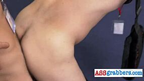 Blindfolded gay hunk grabs ass in office swing 😜