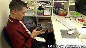 Two Naughty Twinks Engage in Hardcore Anal Session at Office Desk.