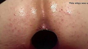 Elly Gets Her Ass Fucked By Dildo From Behind