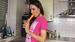 russian nataly gold teases her hole with carrot in kitchen