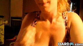 busty wife giving handjob to her husband