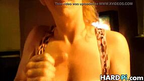 busty wife giving handjob to her husband