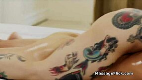 hot tattooed masseuse milks oily cock