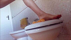 Does Lovenia really play with hot pee on oranges?