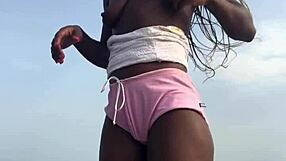 Crazybitch twerking hard in sexy clothes on beach