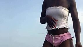 Crazybitch twerking hard in sexy clothes on beach