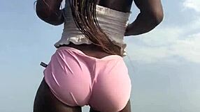 Crazybitch twerking hard in sexy clothes on beach