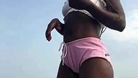 Crazybitch twerking hard in sexy clothes on beach